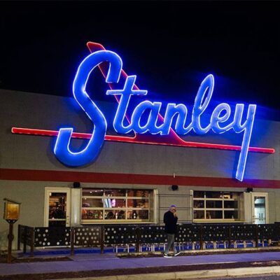 Bright neon sign of Stanley's bar.