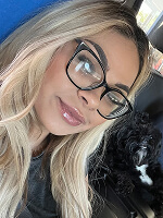 Person with long hair and dog