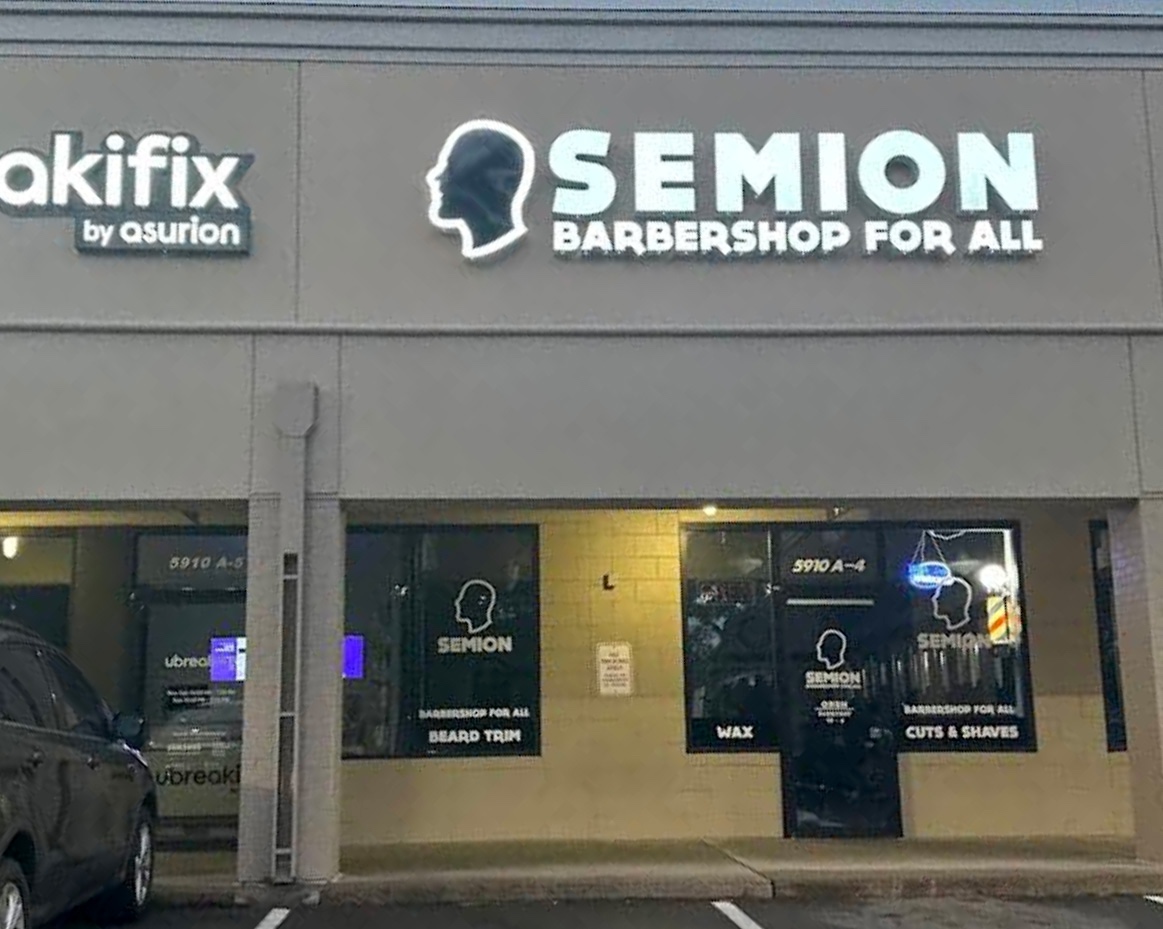 Barbershop with illuminated signage