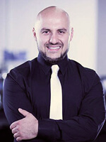 Man in black shirt and tie