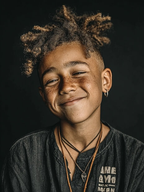 Person with textured curly hairstyle.