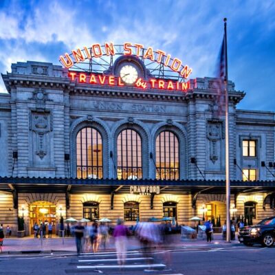 Historic train station with neon sign