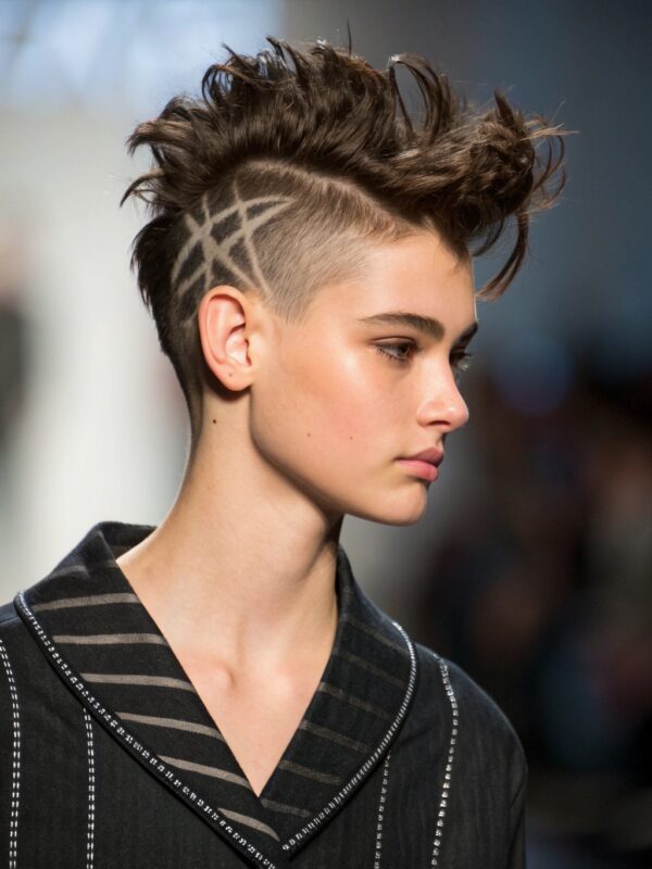 Unique hairstyle with geometric design.